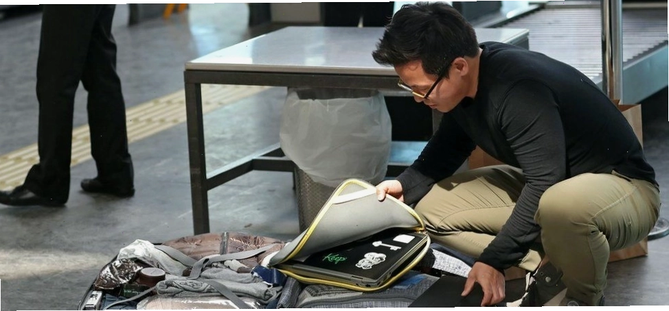 7kg hành lý xách tay có bao gồm laptop không?