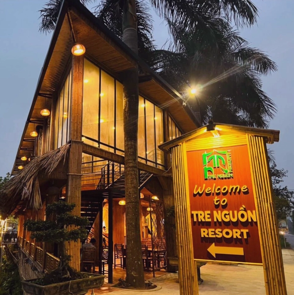 Lối đi xanh mát dẫn vào Tre Nguồn Resort