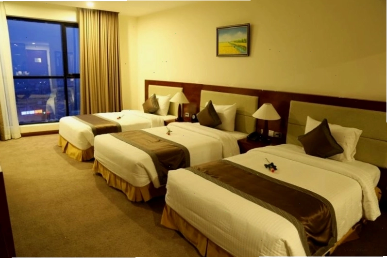 Phòng Deluxe Triple tại Mường Thanh Grand Quảng Trị